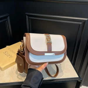 Retro color-block saddle bag in cream and brown leather with gold buckle and mini pouch