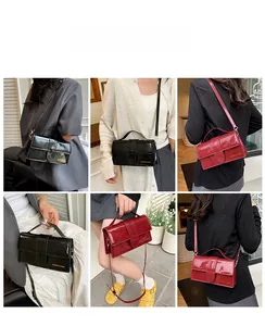Model showcasing vintage glossy PU leather crossbody bag in black and burgundy red
