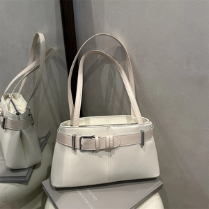 Elegant cream white faux leather tote bag with silver buckle and thin shoulder straps