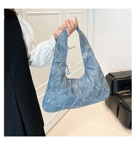 Blue large hobo bag with pleated texture and curved stitching detail for women