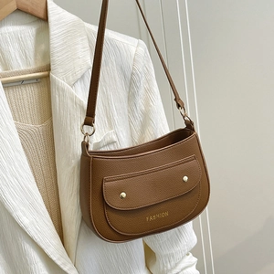 Brown litchi grain faux leather shoulder bag with gold rivets and fashion logo detail