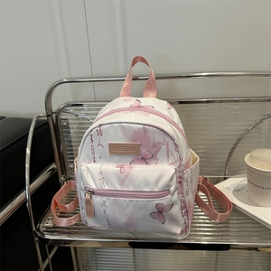 Mini Rucksack in Weiß mit rosa Schmetterlingsdrucken und chinesischer Kalligrafie für Damen