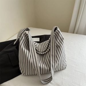 Large capacity striped canvas tote bag with knot strap design for daily fashion use