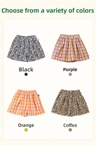 Détail de shorts extensibles pour filles avec motifs zèbre, léopard et carreaux colorés
