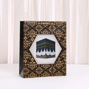 Black and gold kraft gift bag with Kaaba architecture print and golden rope handle