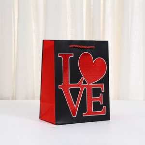 Elegant black and red Valentine's LOVE heart paper gift bag with red rope handles