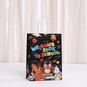 Detail of Welcome Back to School gift bag with colorful alphabet and student stationery