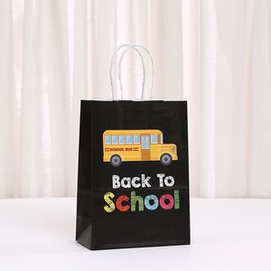 Black Back to School gift bag with yellow school bus illustration and white rope handles