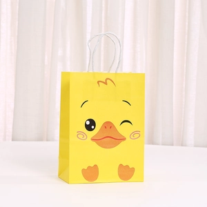 Cute yellow cartoon duck gift paper bag with white rope handles for party favors