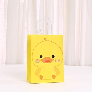 Cute yellow cartoon duck kraft paper gift bag with white handles for parties
