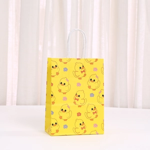 Kraft paper gift bag with cute yellow duck pattern and sturdy white rope handles