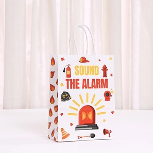 Detail view of Firefighter theme kraft paper gift bag with Sound the Alarm text and cotton ropes