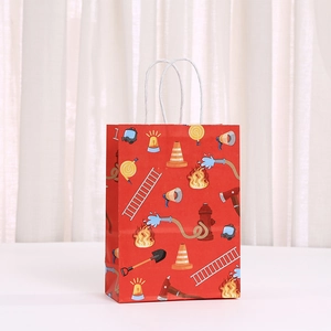 Red kraft paper gift bag with fire truck and firefighting theme prints for birthday parties