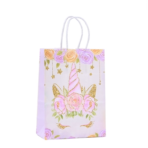 Unicorn floral kraft paper gift bag with golden glitter horn and white twist handles