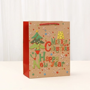 Brown kraft paper Christmas gift bag with festive tree print and red side gusset
