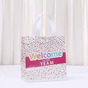 Sac cadeau en non-tissé blanc avec confettis et slogan Welcome TO THE TEAM