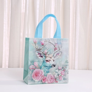 Detail of reindeer and pink flower print on eco-friendly non-woven holiday gift tote bag