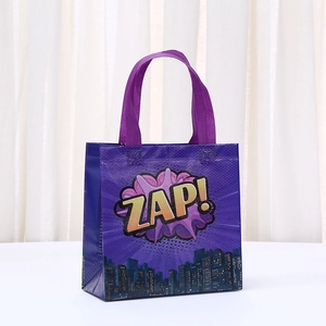 Purple non-woven gift bag with ZAP! comic print and city skyline silhouette