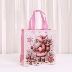 Pink Christmas non-woven gift bag featuring vintage Santa Claus and snowflake prints