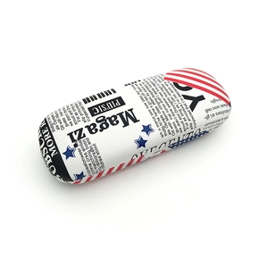 Detail of hardshell glasses case featuring American flag print and newspaper pattern
