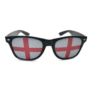 Detail view of England flag mesh lenses on black plastic party sunglasses