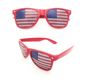 Dual-view detail of patriotic US flag pinhole sunglasses with classic red plastic frames