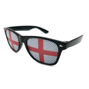 Detail of black plastic sunglasses with England flag mesh lenses and UV400 protection