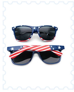 Detailed view of two US flag themed sunglasses with stars and stripes patterns
