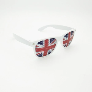 Detail of white party sunglasses featuring British flag pinhole lens stickers