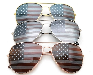Three aviator sunglasses with American flag lenses and metal frames in gold and silver