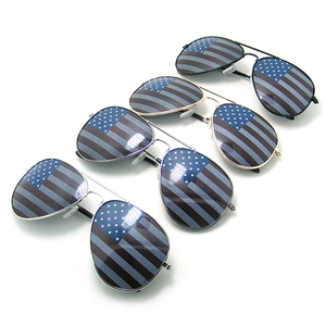 Detail of four aviator sunglasses with American flag pattern lenses and metal frames