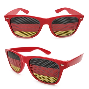 Detail of red sports sunglasses featuring German flag perforated lenses for fans