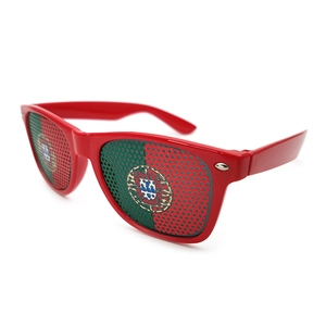 Red frame sunglasses with Portugal flag perforated mesh lenses on white background