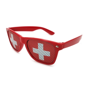 Red party sunglasses featuring a Swiss flag pattern on mesh lenses with a classic frame