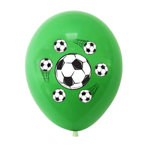 Detail of green latex balloon with black and white football patterns for sports parties