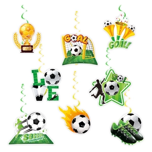 Macro detail of World Cup soccer party swirl decorations with gold trophies and cleats