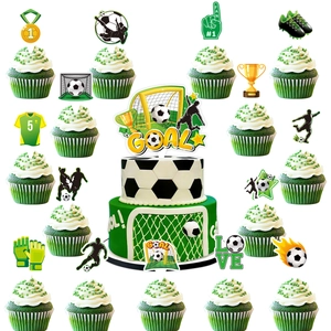 Detail view of soccer-themed cake toppers set including trophies and players for party decor