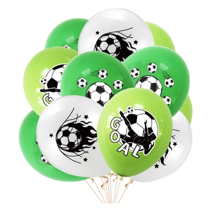 Close-up of World Cup party balloons featuring soccer patterns and GOAL text