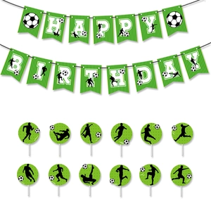 Detail of football birthday party banner and cake toppers with soccer player silhouettes