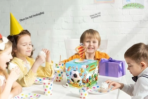 Detail of soccer theme money pull box with Happy Birthday graphics for kids party gift