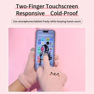 Pink knit touchscreen gloves featuring smiley face embroidery and conductive fingertips
