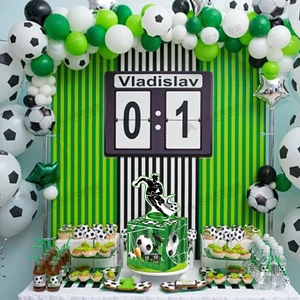 Soccer themed money pull box with a player silhouette atop a green party gift case