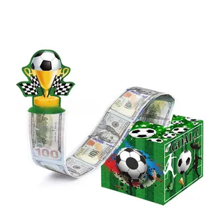 Detail of soccer theme money pull box set with GOAL graphics and pull tab for cake decoration