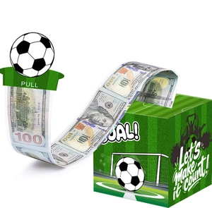 Detail of soccer themed money pulling box with green lawn patterns and football handle