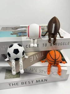 Macro detail of 3D printed sports figures with movable ball joints on props