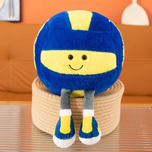 Divertente peluche a forma di pallavolo con sorriso e scarpe da ginnastica nel cesto