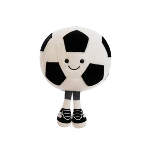Peluche a forma di pallone da calcio con faccia sorridente e scarpe da ginnastica nere