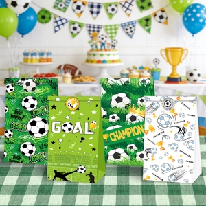 Detailed soccer party gift bags with Goal and Champion prints on a checkered tablecloth