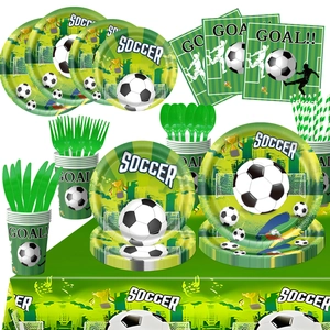 Detailed view of green soccer theme party tableware set with paper plates and cups