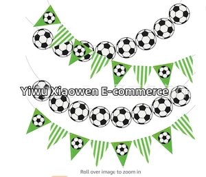Detail of soccer party banner set featuring football cards and green pennants for decoration